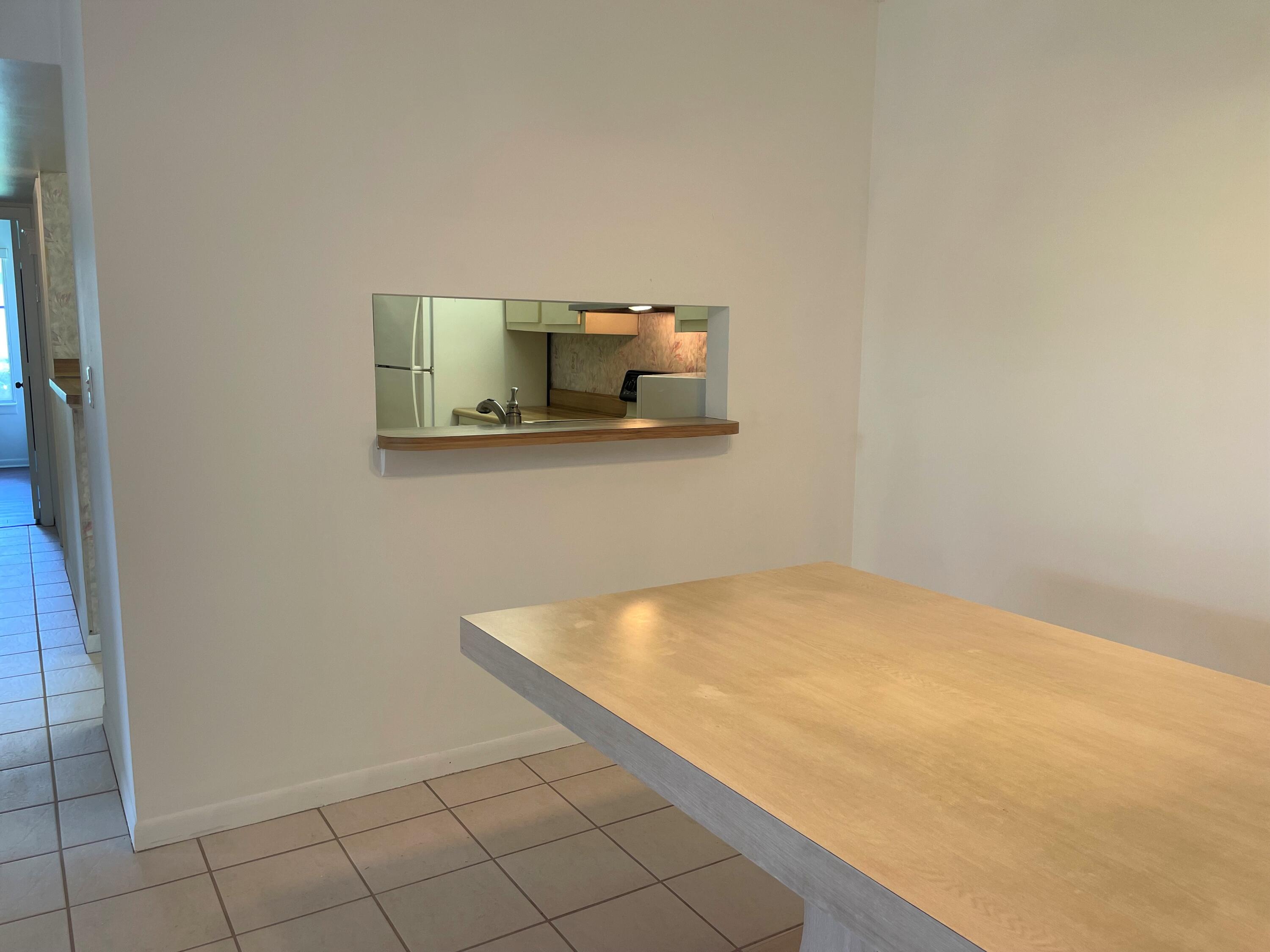 6485 Chasewood Drive, Unit C Jupiter, FL 33458 - Photo 7 of 23 a room with storage and utility