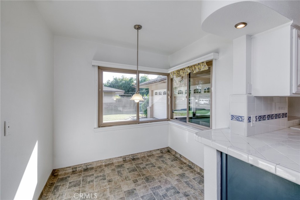 610 Park Madera, CA 93637 - Photo 16 of 35 a kitchen that has a lot of windows in it