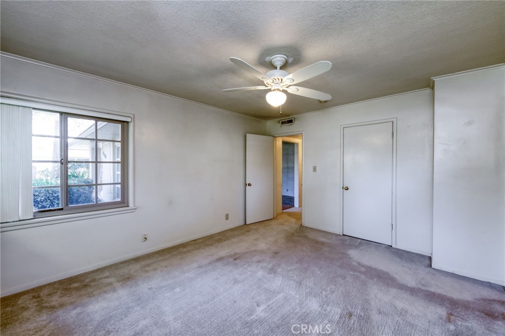 610 Park Madera, CA 93637 - Photo 25 of 35 an empty room with windows and fan