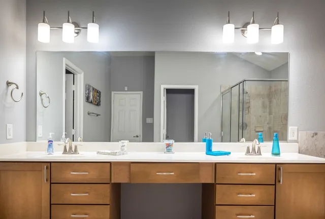 a bathroom with a bathtub and a shower