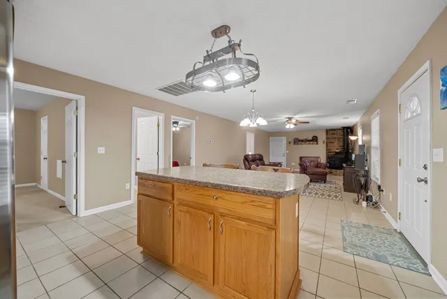 a view of a kitchen and dining area