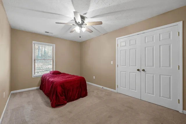 a view of storage and utility room with utility and racks