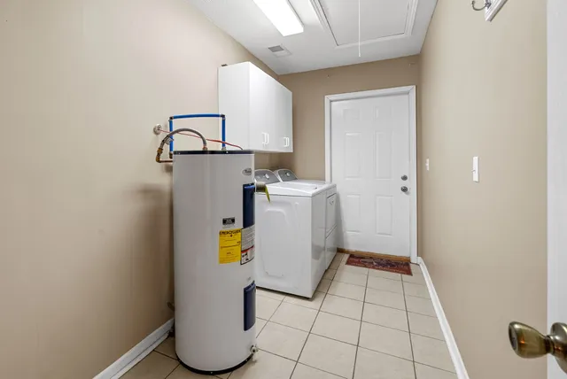 a front view of a house with a yard table and chairs