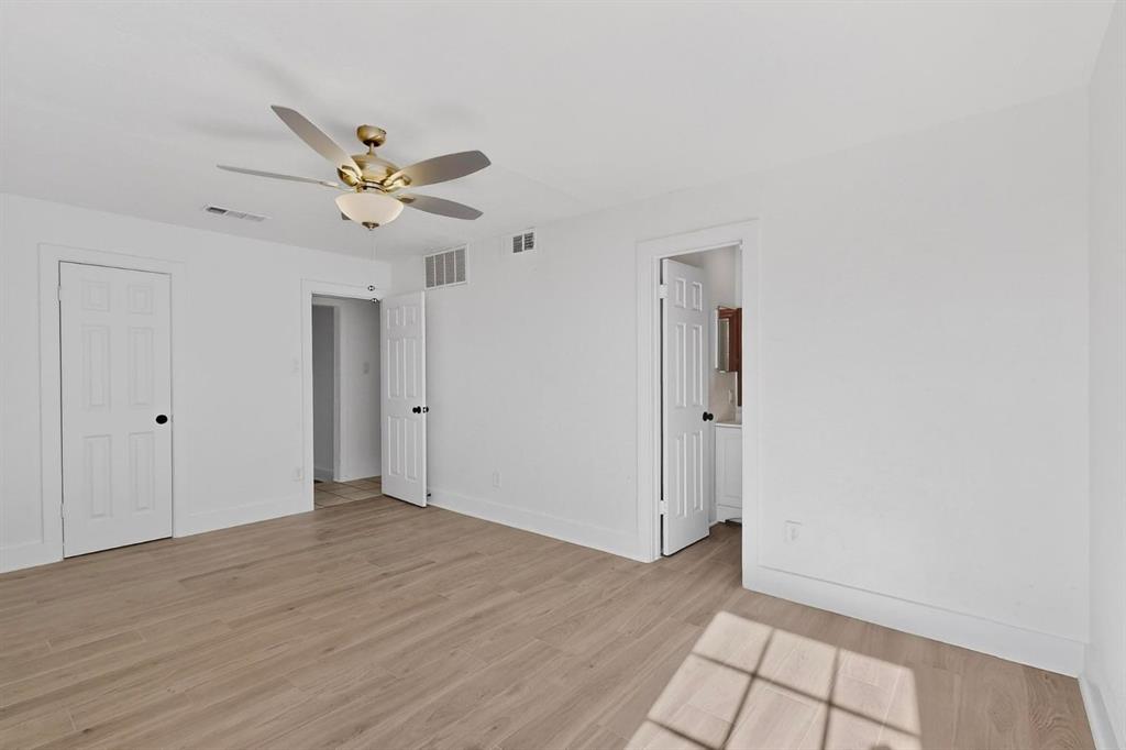 9918 Cedar Mountain Circle Dallas, TX 75217 - Photo 14 of 23 a view of an empty room