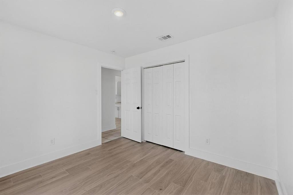 9918 Cedar Mountain Circle Dallas, TX 75217 - Photo 17 of 23 a view of an empty room