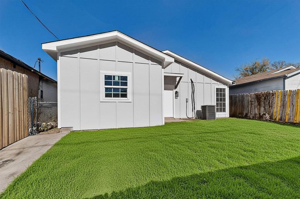 9918 Cedar Mountain Circle Dallas, TX 75217 - Photo 23 of 23 a front view of a house with yard
