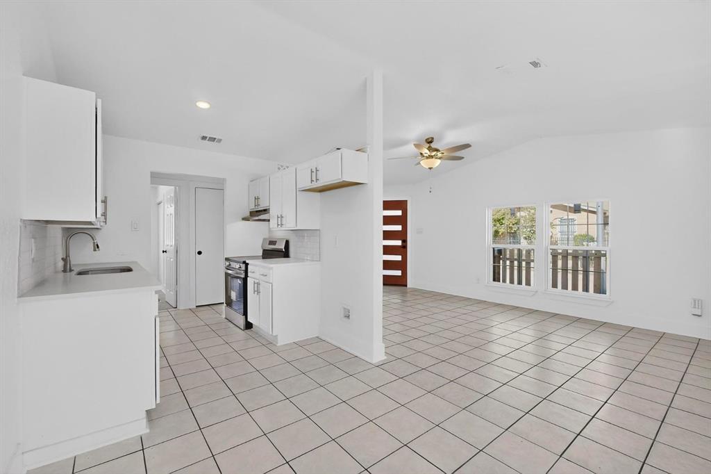 9918 Cedar Mountain Circle Dallas, TX 75217 - Photo 4 of 23 a view of kitchen with furniture and window