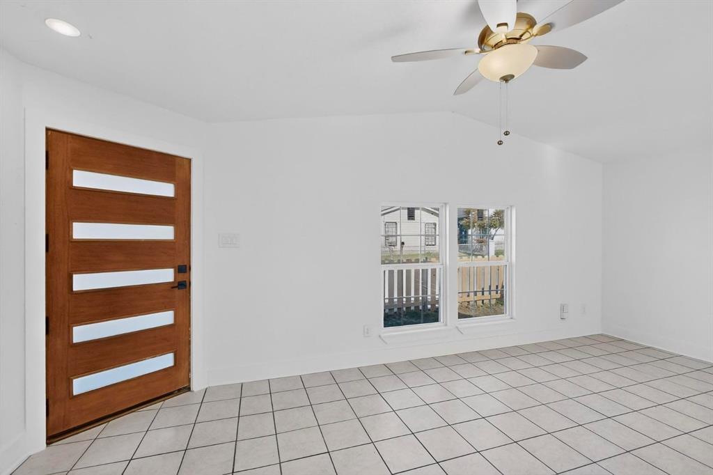 9918 Cedar Mountain Circle Dallas, TX 75217 - Photo 5 of 23 a view of an empty room with a window