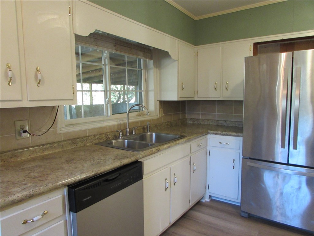 3540 Williams Street Patterson, GA 31557 - Photo 12 of 22 Appliances are included. This kitchen window looks out onto the screened mancave in the back.