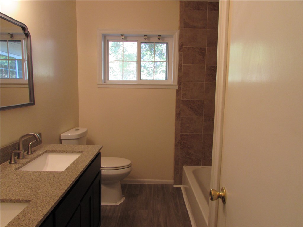 3540 Williams Street Patterson, GA 31557 - Photo 16 of 22 The hall bathroom has been renovated with double sinks.