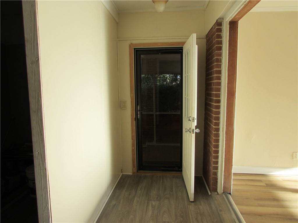 3540 Williams Street Patterson, GA 31557 - Photo 8 of 22 The side entrance from the carport area has a new door and storm door.