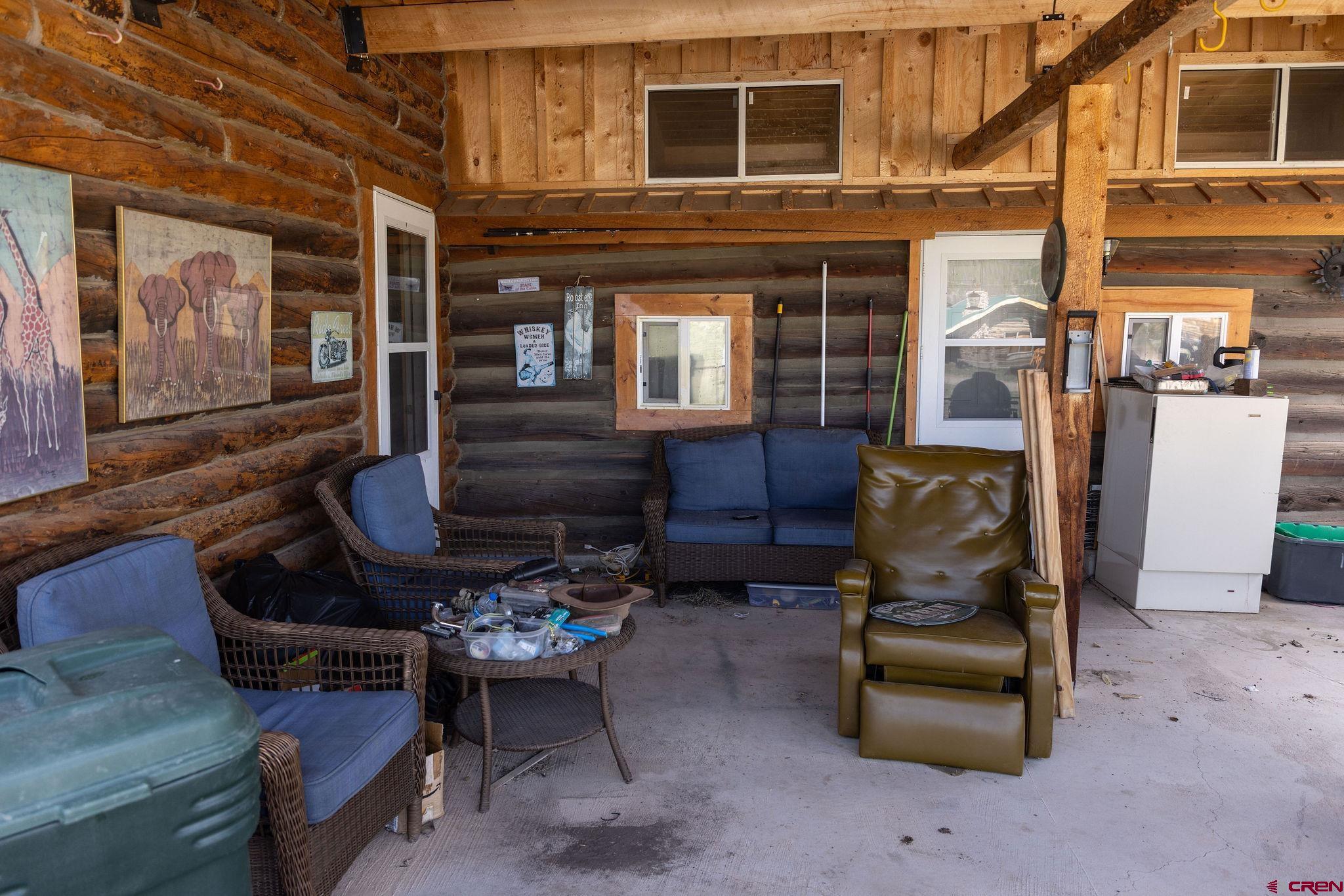 4650 Usfs Rd 516 Creede, CO 81130 - Photo 24 of 33 a building outdoor space with patio furniture and potted plants