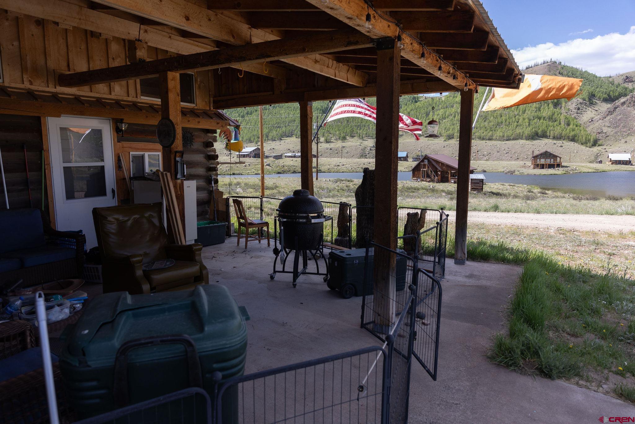 4650 Usfs Rd 516 Creede, CO 81130 - Photo 25 of 33 a view of a porch with chairs and backyard