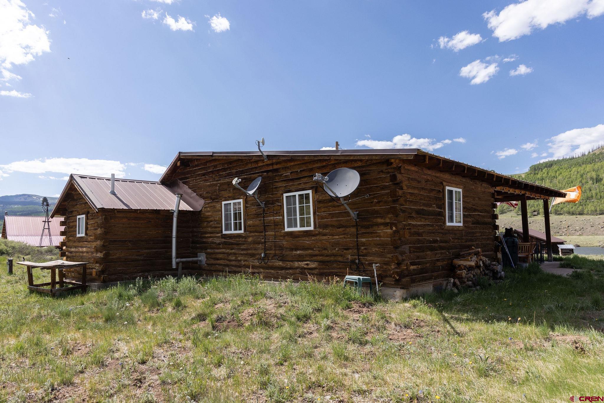4650 Usfs Rd 516 Creede, CO 81130 - Photo 27 of 33 a front view of a house with a yard