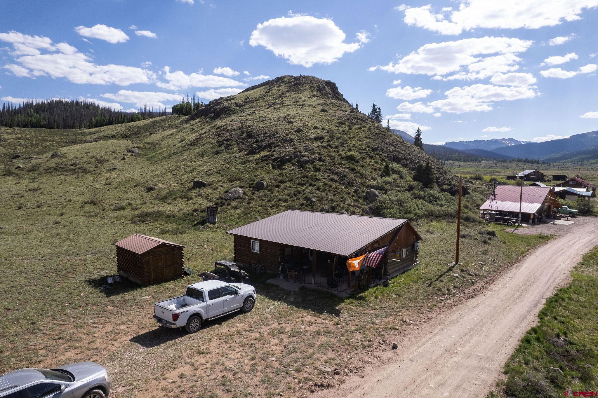 4650 Usfs Rd 516 Creede, CO 81130 - Photo 29 of 33 a backyard of a house with table and chairs
