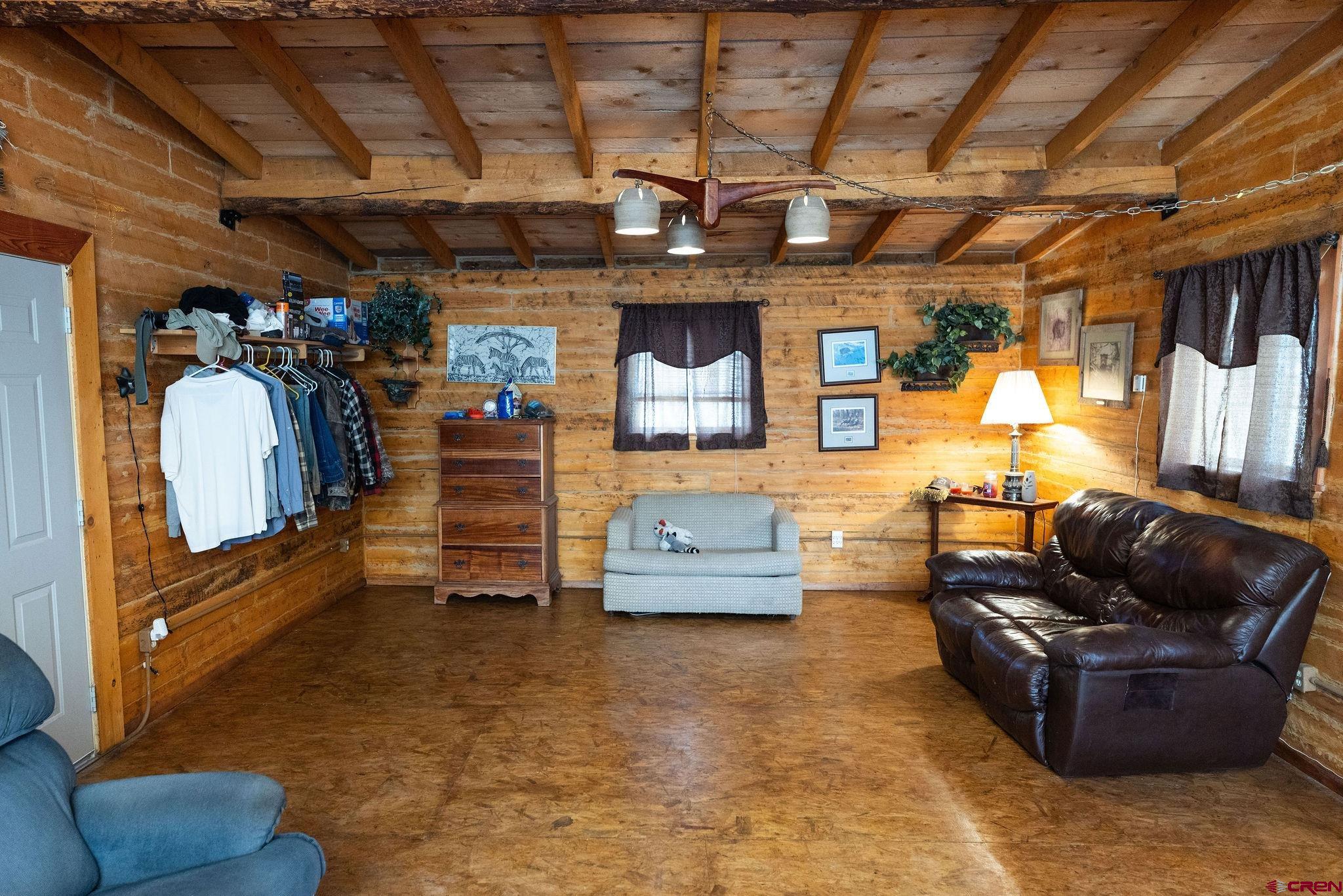 4650 Usfs Rd 516 Creede, CO 81130 - Photo 3 of 33 a living room with furniture and a flat screen tv