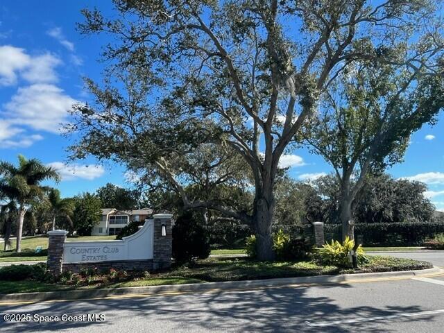 1004 Connolly Lane Northeast Palm Bay, FL 32905 - Photo 3 of 4 a view of street along with residential houses