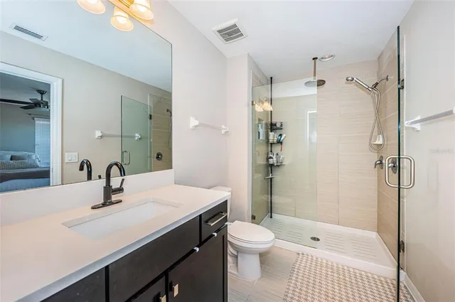 a view of outdoor space with garden and signage