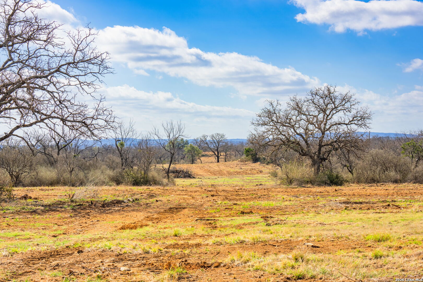 3722 Ranch Road 2241 Llano, TX 78643 - Photo 21 of 41 a view of yard covered with snow in the background