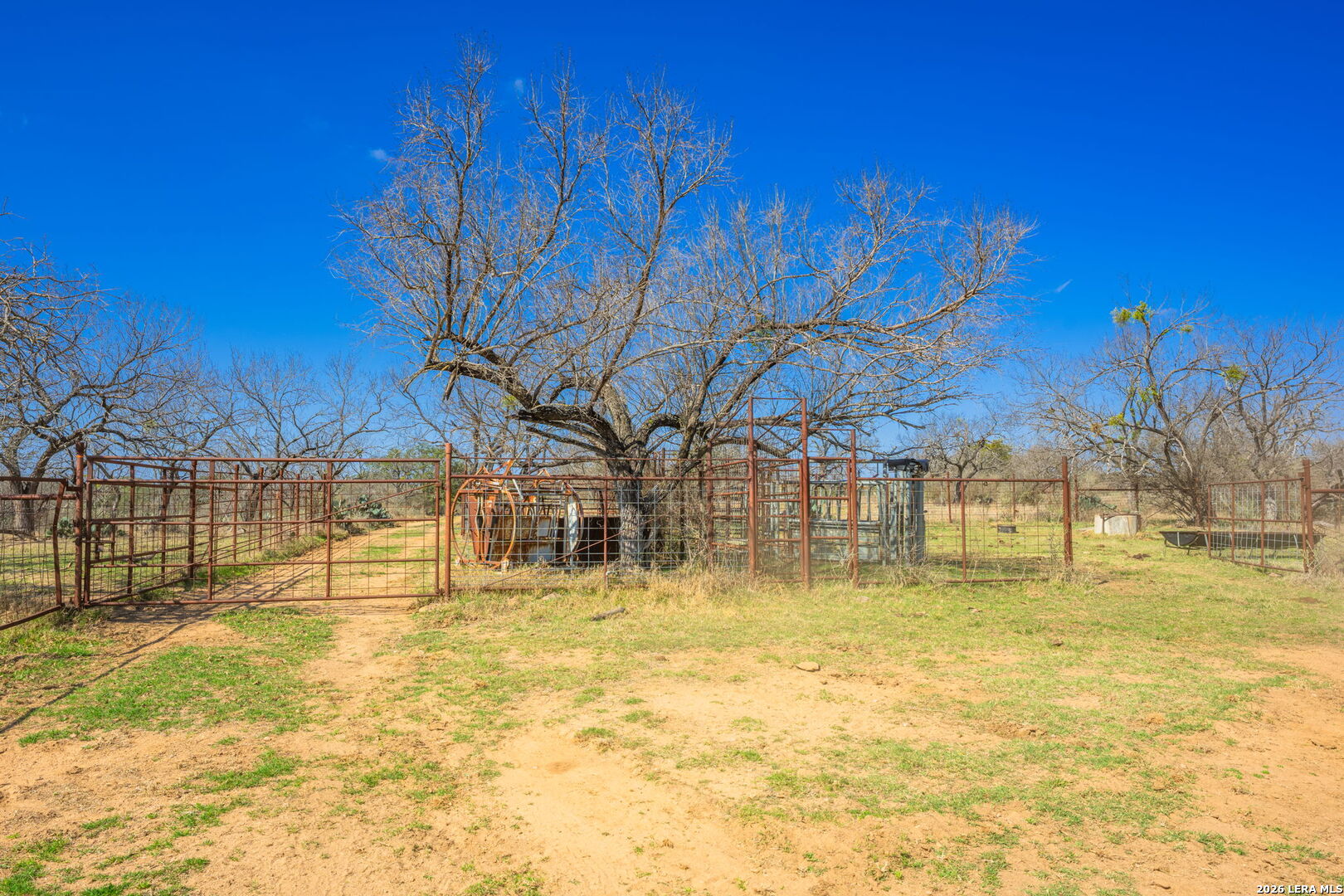 3722 Ranch Road 2241 Llano, TX 78643 - Photo 29 of 41 a swimming pool that has lawn chairs under an umbrella
