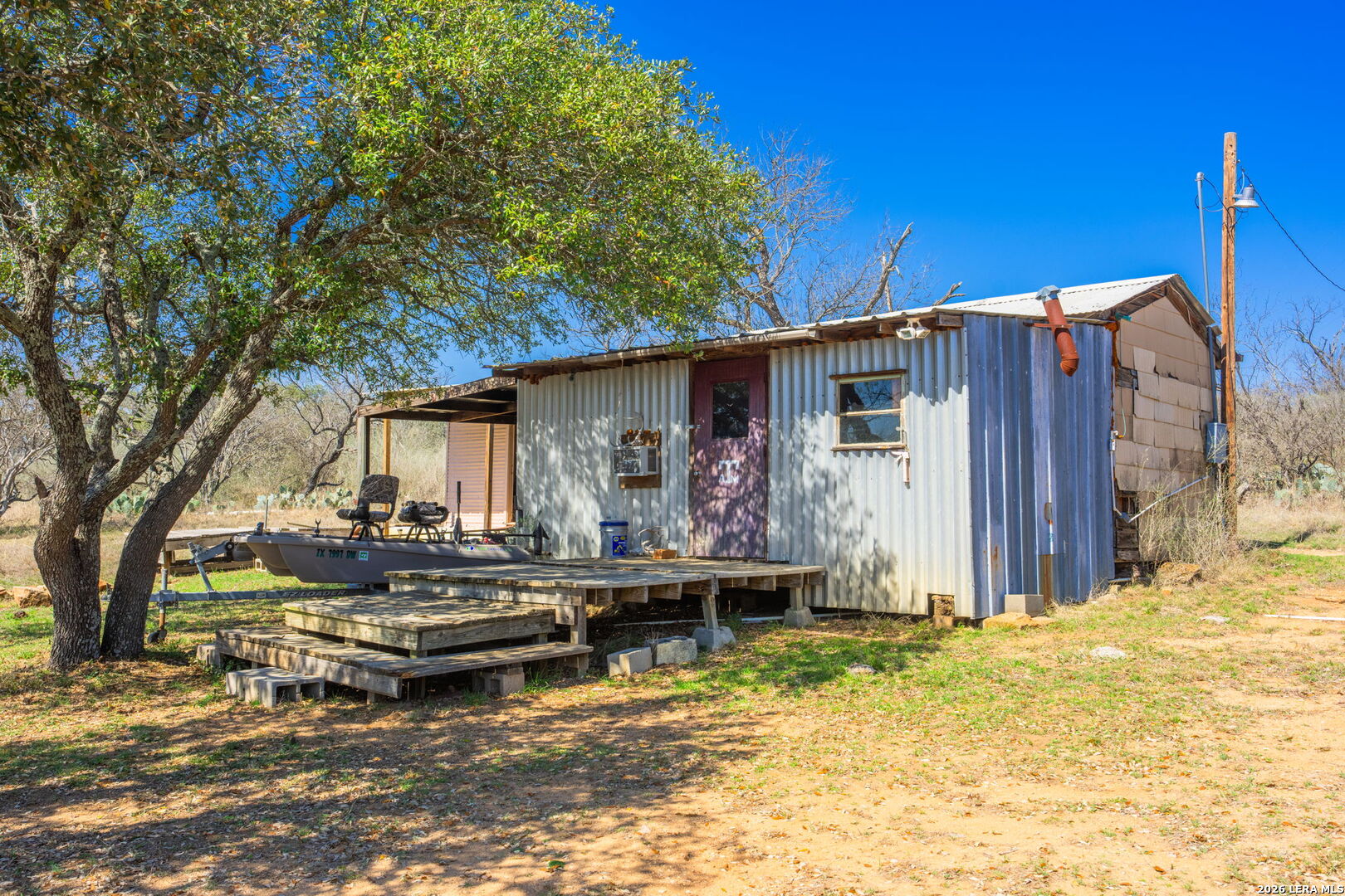 3722 Ranch Road 2241 Llano, TX 78643 - Photo 36 of 41 a view of a house with backyard porch and sitting area