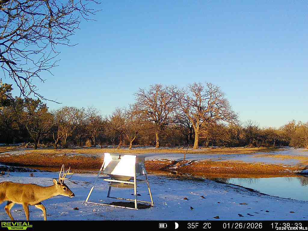3722 Ranch Road 2241 Llano, TX 78643 - Photo 39 of 41 a view of a swimming pool with an outdoor space and seating area