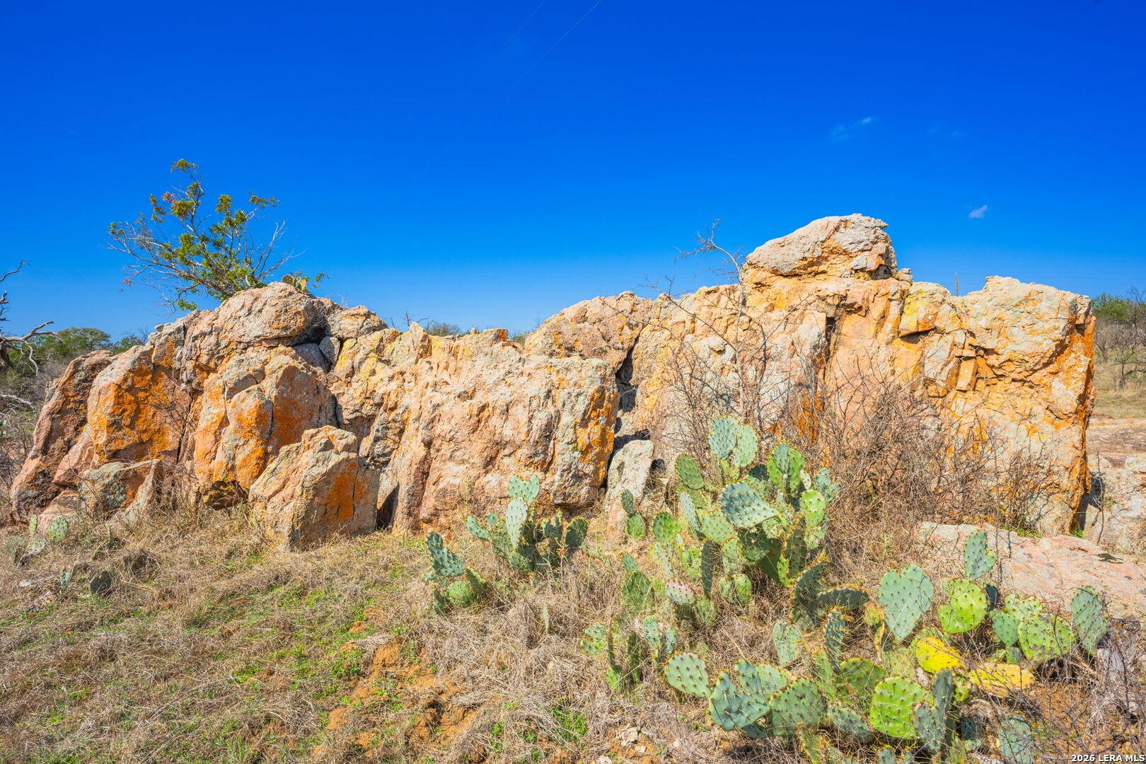 3722 Ranch Road 2241 Llano, TX 78643 - Photo 7 of 41 a view of a road with a building in the background