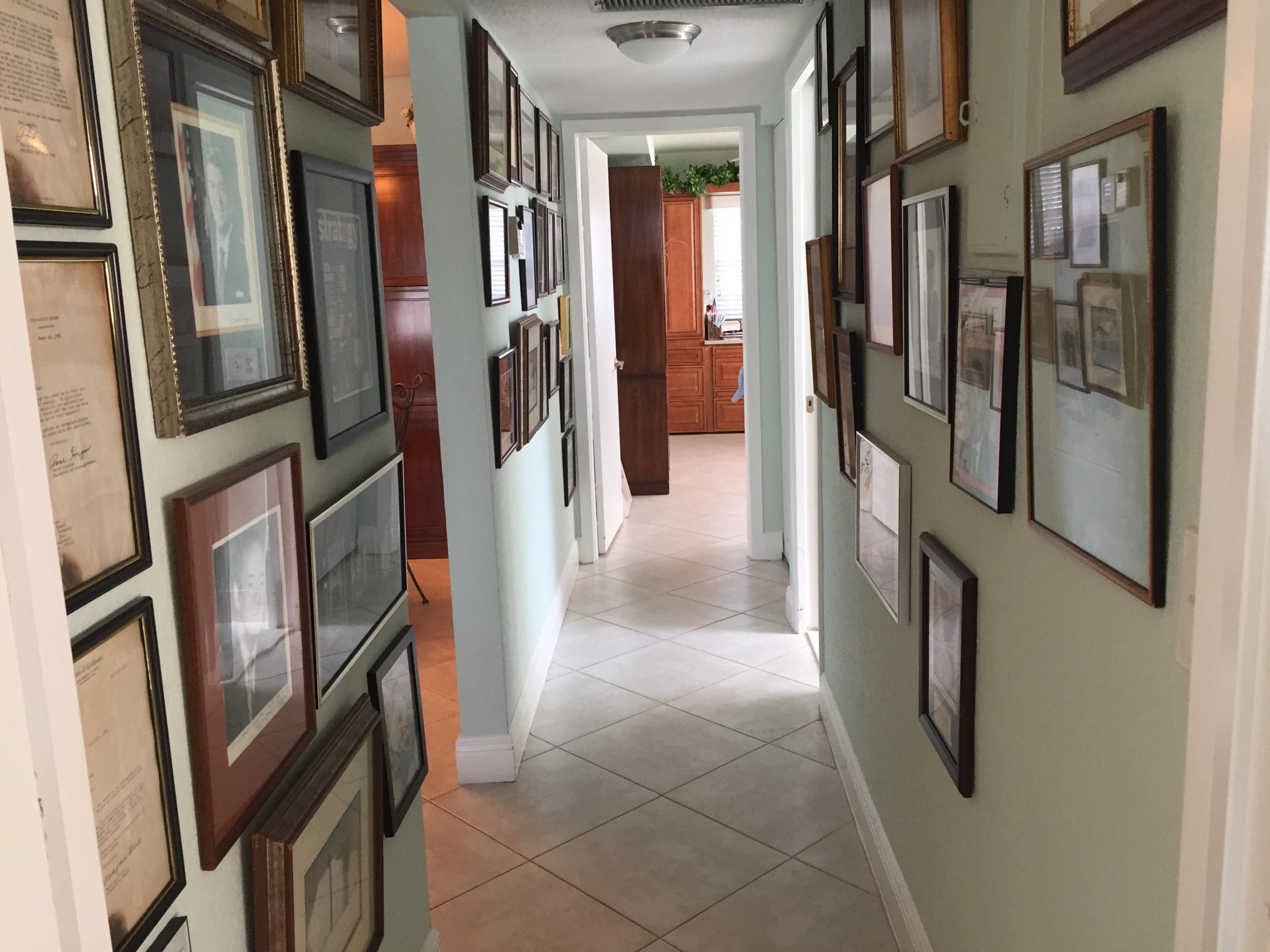 1072 Exeter Boca Raton, FL 33434 - Photo 22 of 32 HALLWAY LOOKING TO 2ND BEDROOM/STUDY