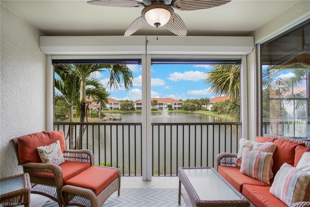 23821 Marbella Bay Road, Unit 202 Estero, FL 34135 - Photo 21 of 42 a living room with furniture and a window