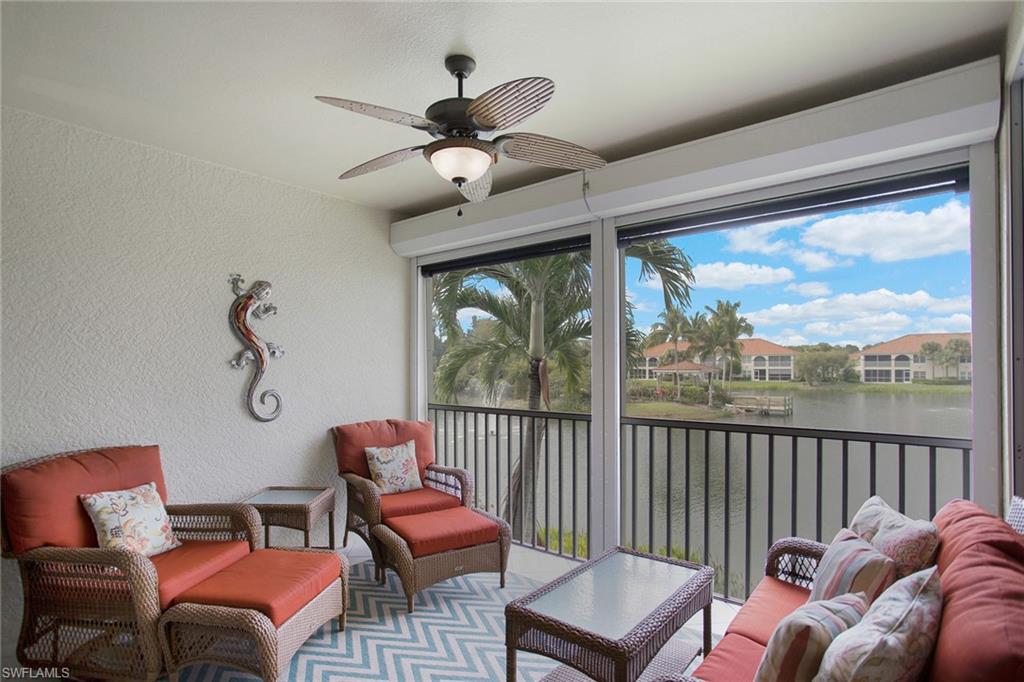 23821 Marbella Bay Road, Unit 202 Estero, FL 34135 - Photo 22 of 42 a living room with furniture a ceiling fan and a window