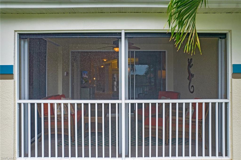23821 Marbella Bay Road, Unit 202 Estero, FL 34135 - Photo 24 of 42 a view of a balcony