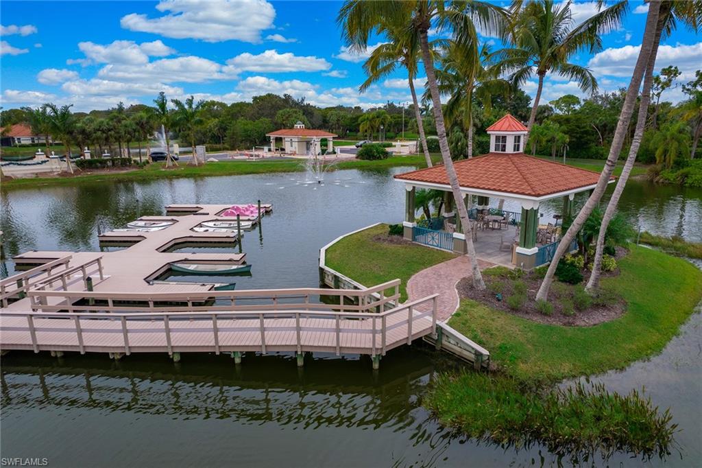 23821 Marbella Bay Road, Unit 202 Estero, FL 34135 - Photo 38 of 42 an aerial view of a house with outdoor space and lake view