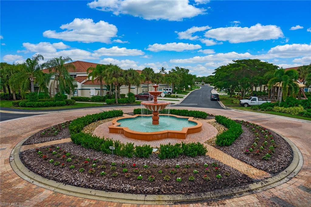 23821 Marbella Bay Road, Unit 202 Estero, FL 34135 - Photo 42 of 42 a view of a garden