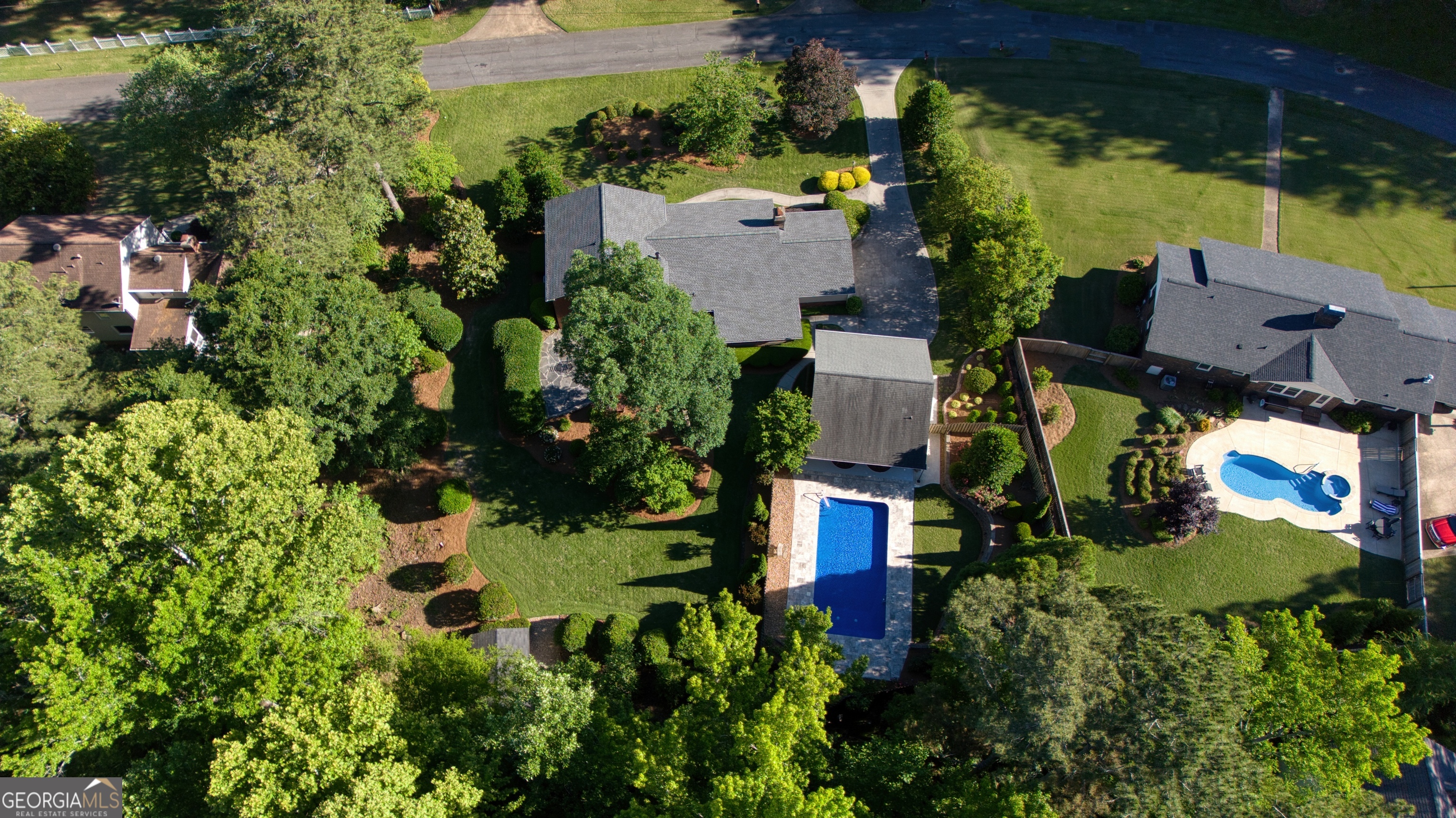 204 Green View Road Southwest Rome, GA 30165 - Photo 4 of 62 an aerial view of a house with a yard and swimming pool