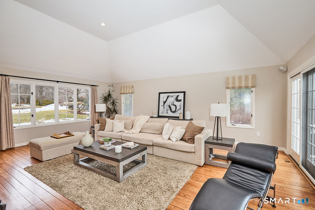 23 Harborview Road Westport, CT 06880 - Photo 12 of 35 a living room with furniture and a large window