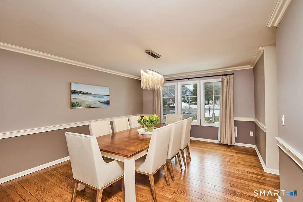 23 Harborview Road Westport, CT 06880 - Photo 17 of 35 a view of a dining room with furniture and wooden floor