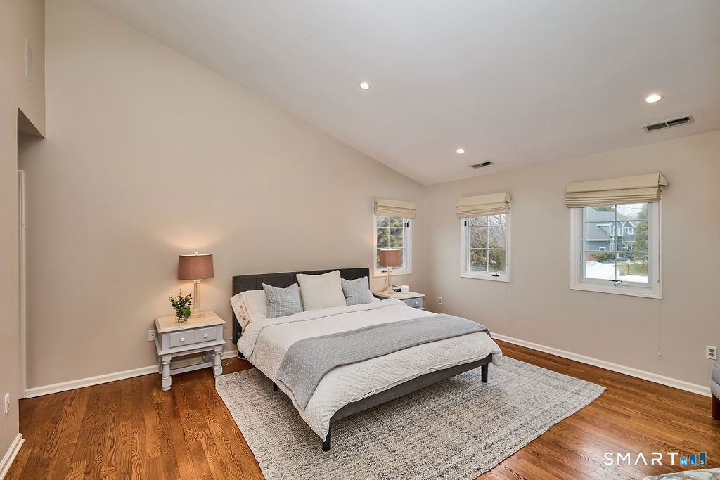 23 Harborview Road Westport, CT 06880 - Photo 18 of 35 a bedroom with a bed and a window