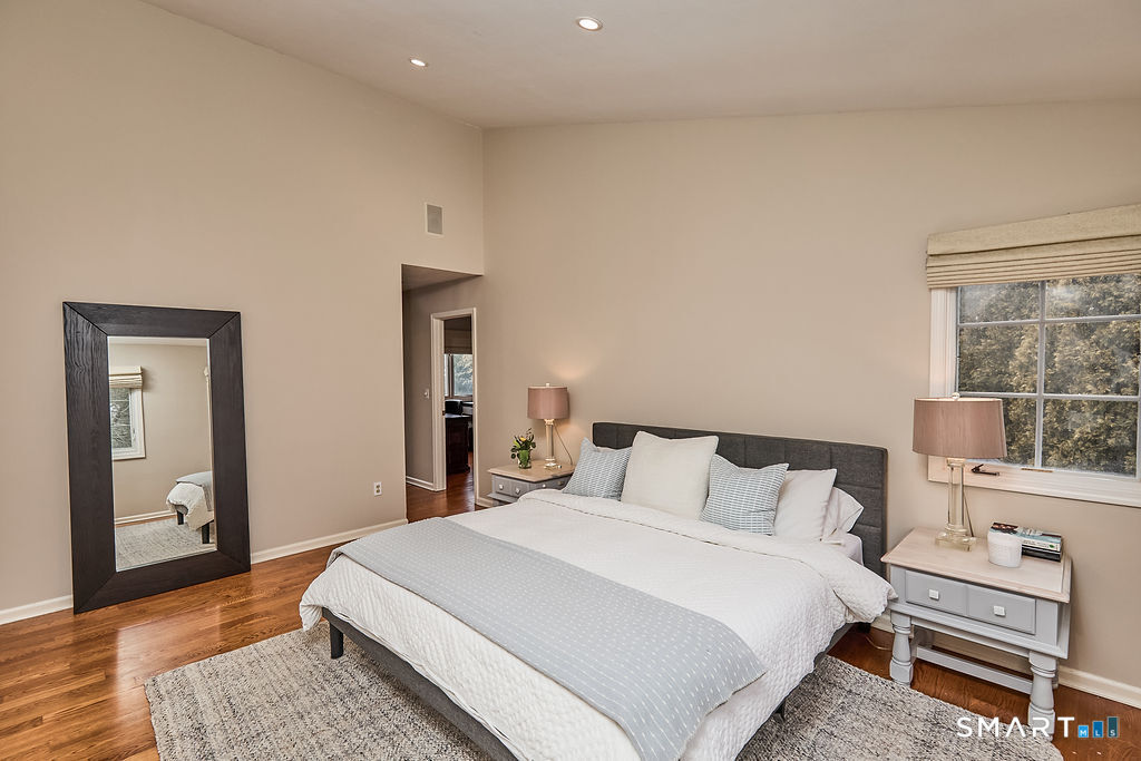 23 Harborview Road Westport, CT 06880 - Photo 19 of 35 a bedroom with a bed and a window