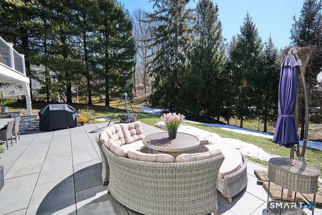 23 Harborview Road Westport, CT 06880 - Photo 30 of 35 a view of outdoor sitting area with furniture and wooden floor