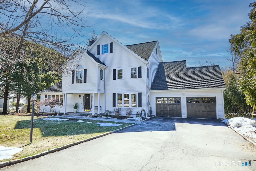 23 Harborview Road Westport, CT 06880 - Photo 33 of 35 a front view of a house with a yard