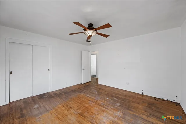 a view of a big room with carpet
