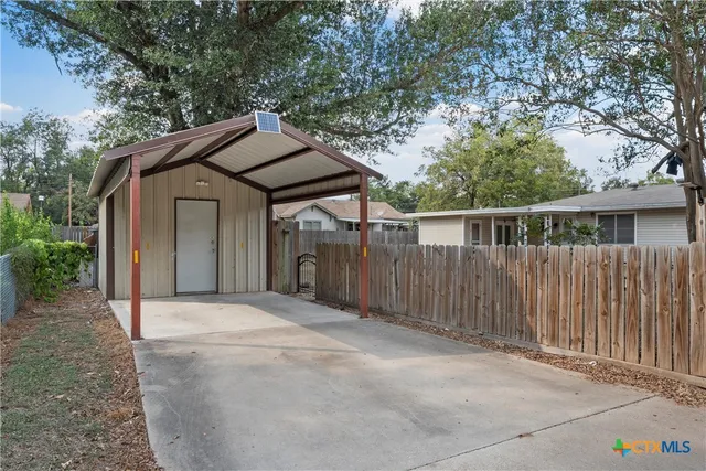 a front view of a house with a garage