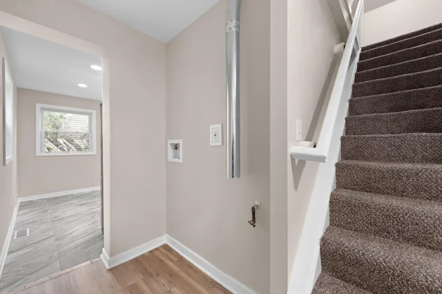 a view of an entryway with staircase