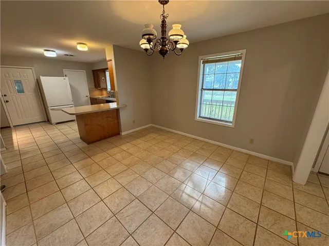 a view of a livingroom with a furniture