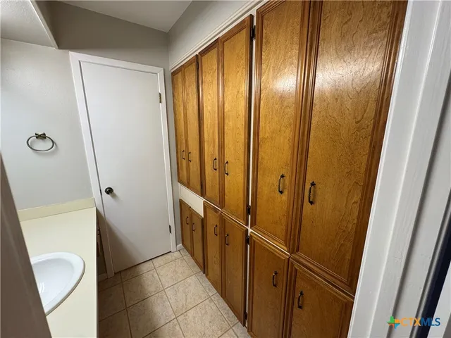 a bathroom with a shower and toilet
