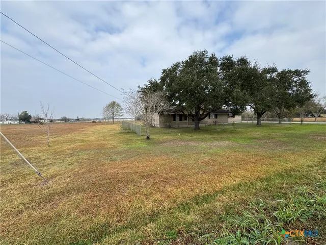 a view of a ocean with a big yard
