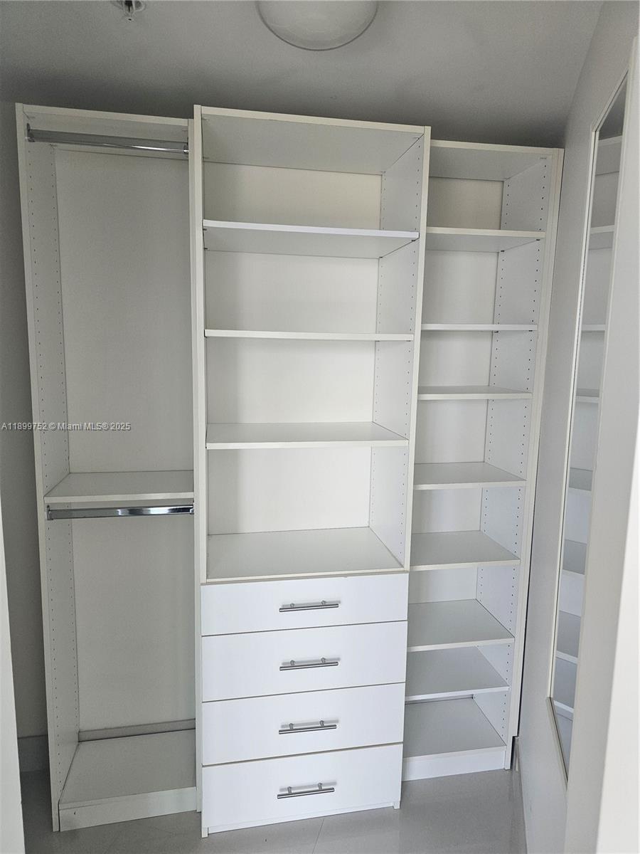 60 Southwest 13th Street, Unit 1900 Miami, FL 33130 - Photo 21 of 95 a view of walk in closet