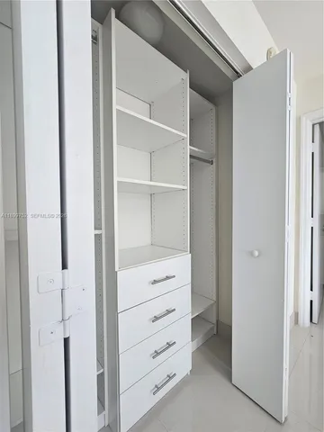 a view of a lobby area with mirror