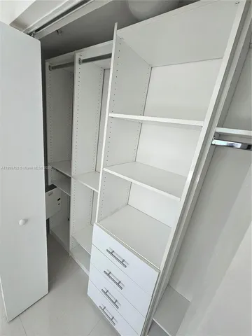 a view of a lobby area with mirror