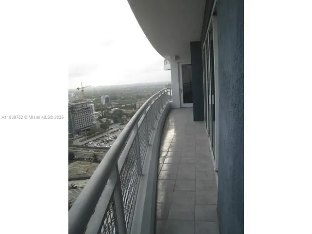 a city street lined with tall buildings